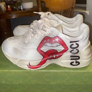 Gucci sneakers size 8.5 wore once,good condition they come with the scuffs.